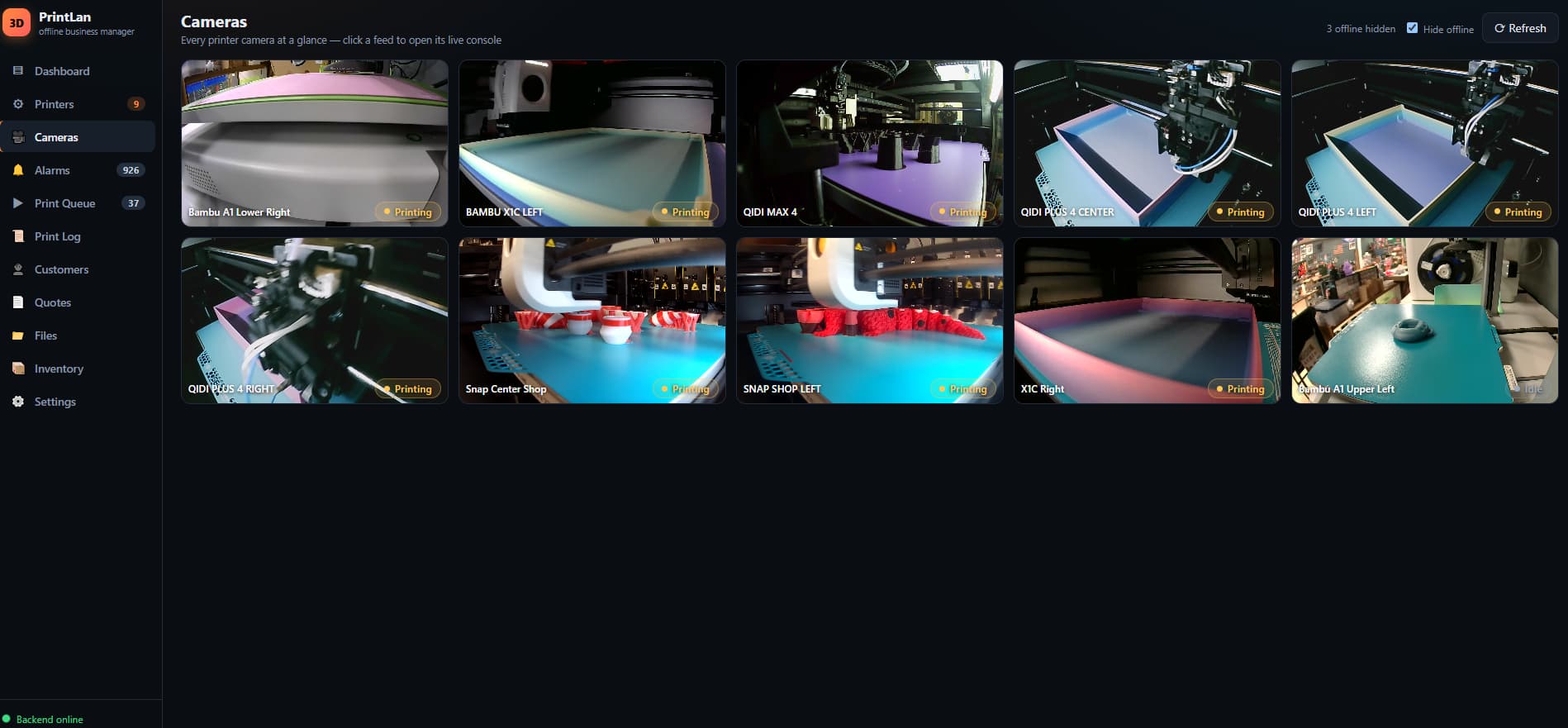 The camera wall in PrintLan: ten live printer feeds — Bambu, Qidi and Snapmaker cameras — each tile labeled with the printer's name and printing status, streaming over the local network.